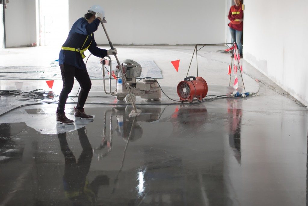 Applying epoxy flooring