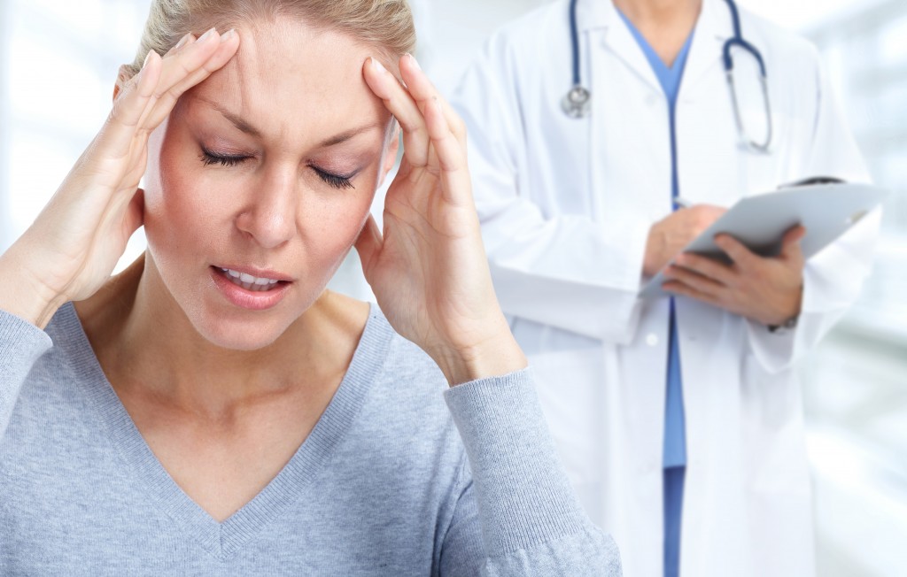 Female with intense migraine