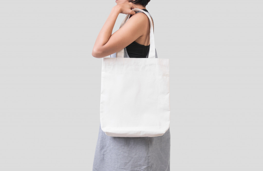 Girl is holding bag canvas fabric
