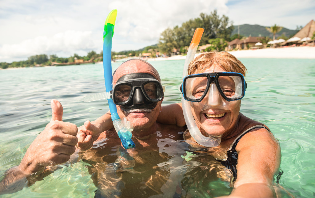 old couple snorkelling