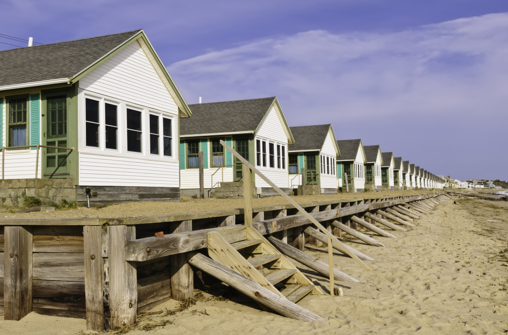 Identical homes with a cape cod design built near a beach