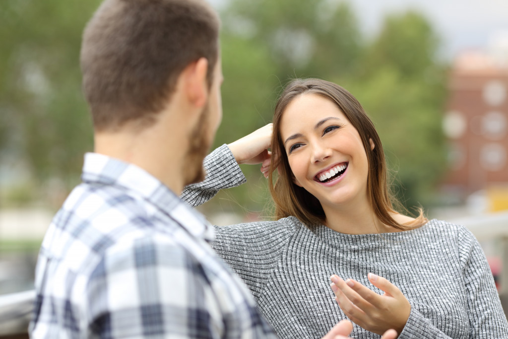 Woman having a fun conversation with a man