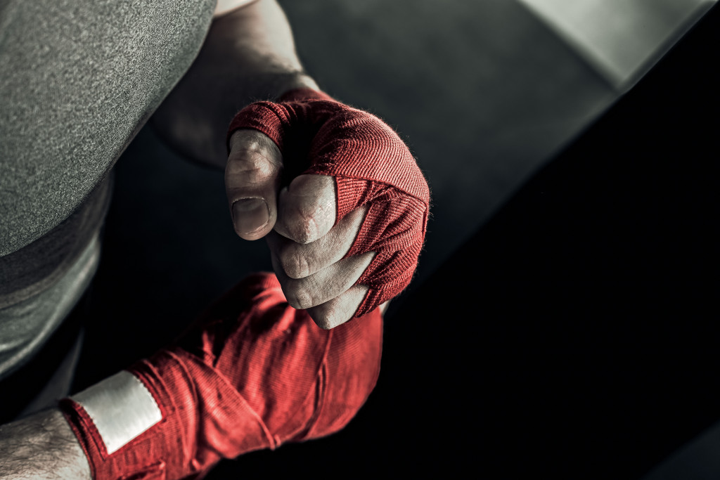 Focus on boxer's hand wraps