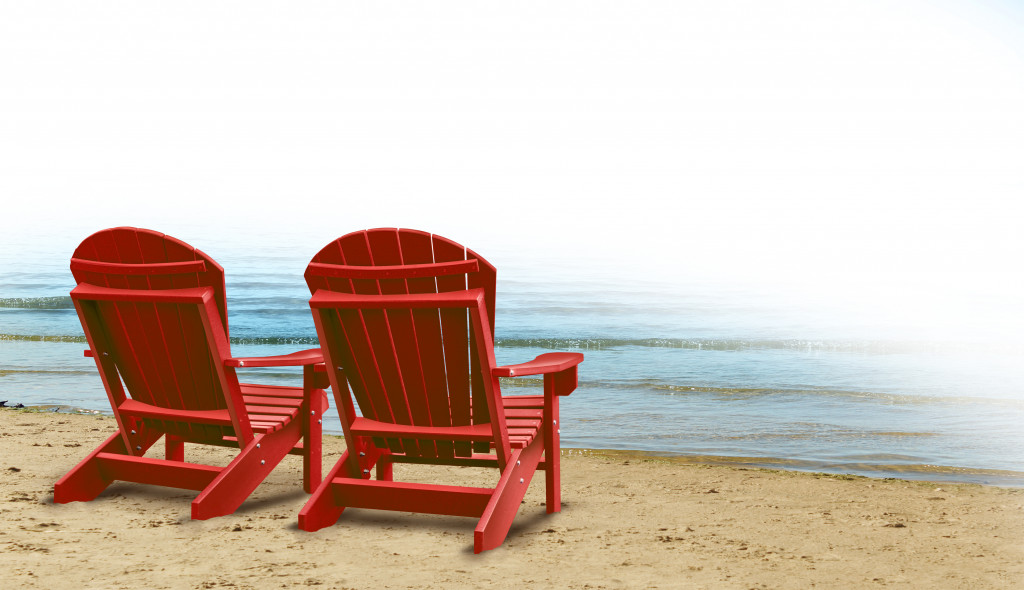 Two red chairs in the beach